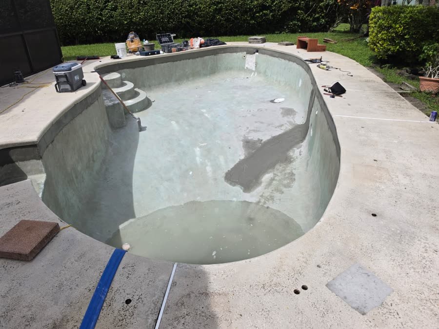 Empty residential pool prepared for renovation